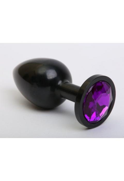 Чёрная анальная пробка с фиолетовым стразом - 7,6 см.