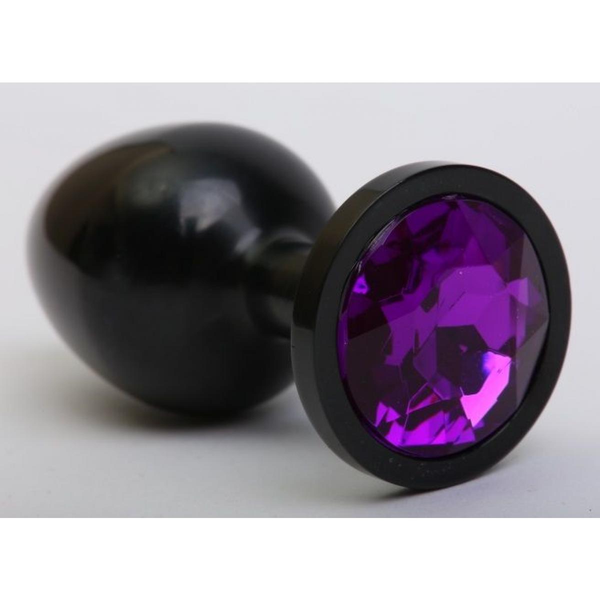 Чёрная анальная пробка с фиолетовым стразом - 8,2 см.