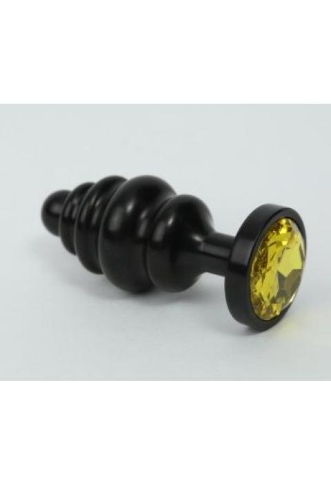 Чёрная ребристая анальная пробка с жёлтым кристаллом - 7,3 см.